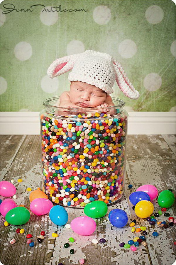 Baby in Jelly Beans. The infant can sit in this big jar and then filled it with jelly beans. The best time to get this shot is to put one jelly bean into its mouth. Make sure that your baby is old enough to eat it.