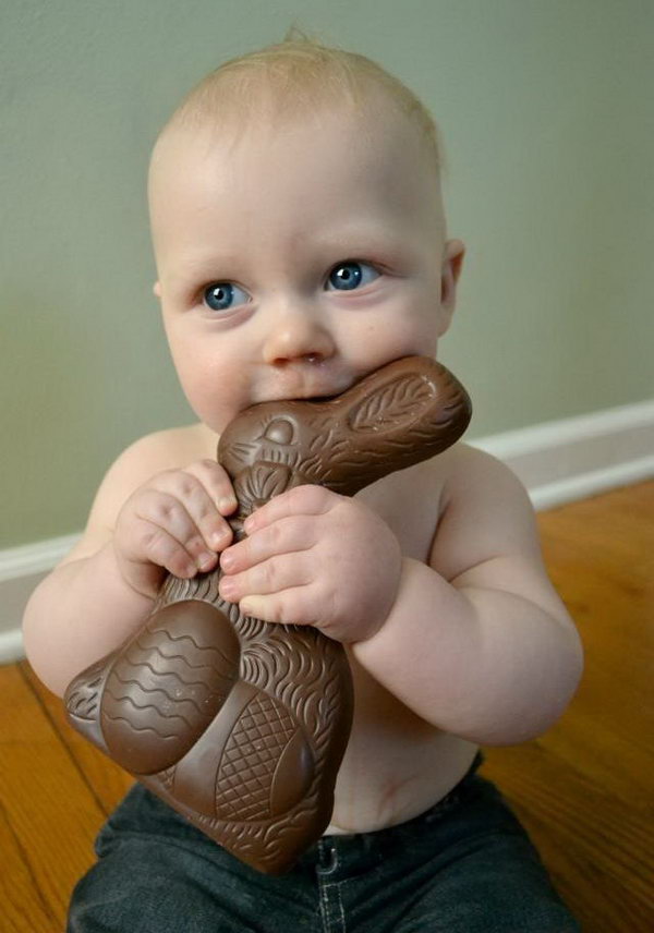 Kid Biting Easter Bunny. You must be very confused about how a kid bite the eater bunny, well this bunny is not real animal, it is made up of chocolate. Wonderful, isn’t it?