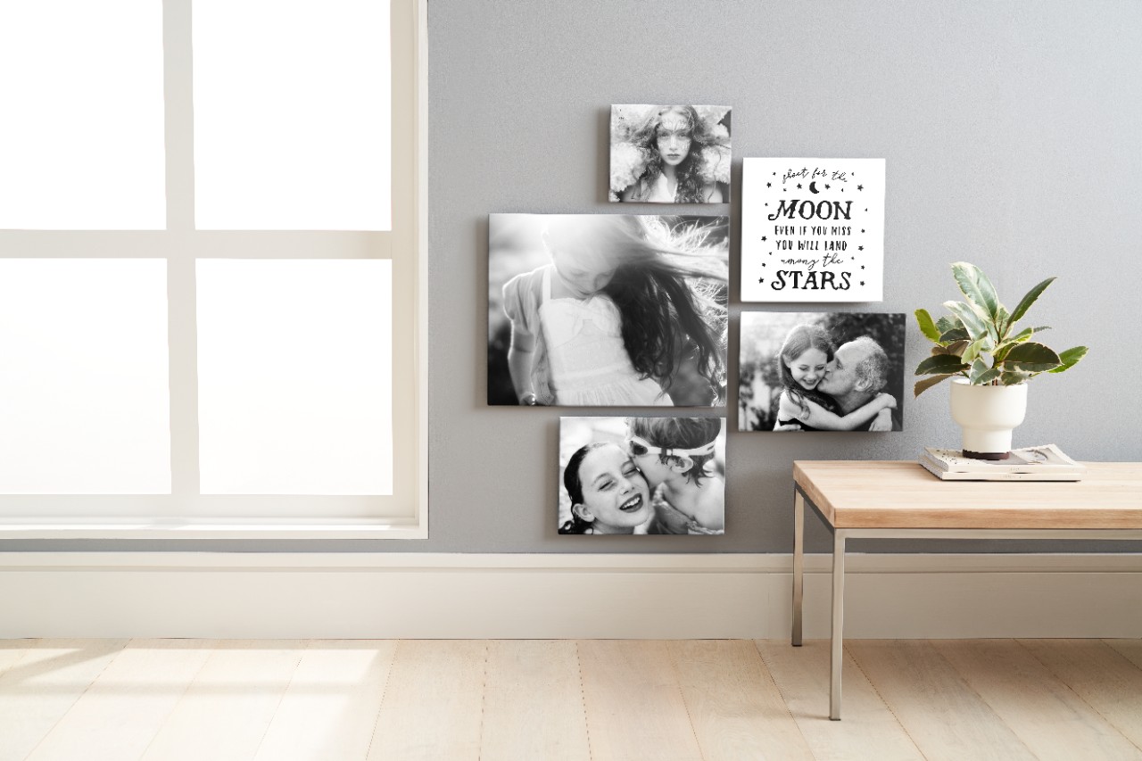 black and white family photo wall in the living room