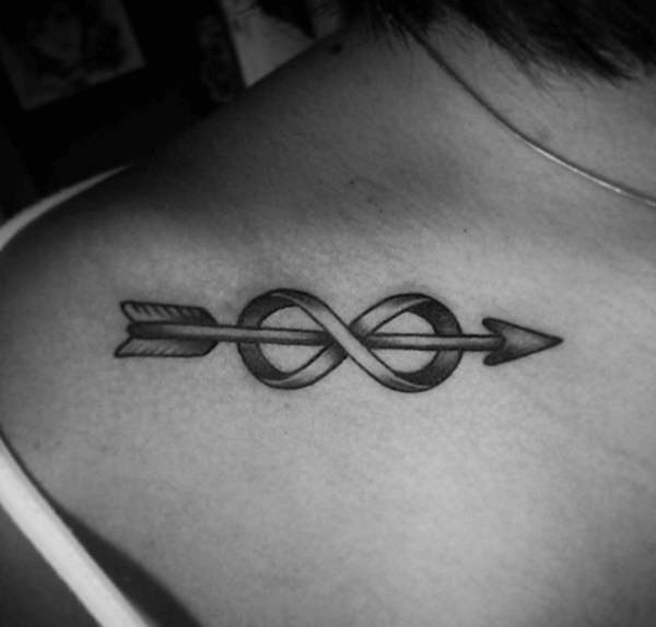 arrow passing through infinity sign loops tattoo