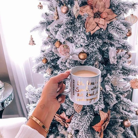 Christmas wallpaper aesthetic with decorated white Christmas tree and coffee