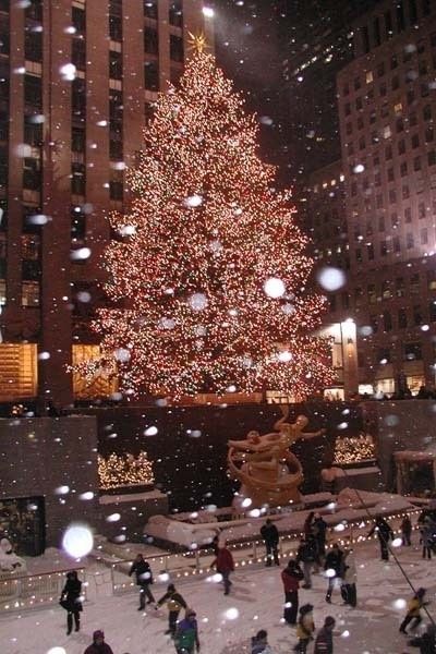 Christmas wallpaper aesthetic with Rockefeller Christmas tree in New York City with snow