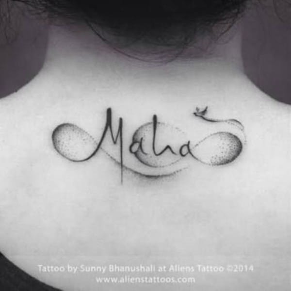 Dotwork with name tattoo on back