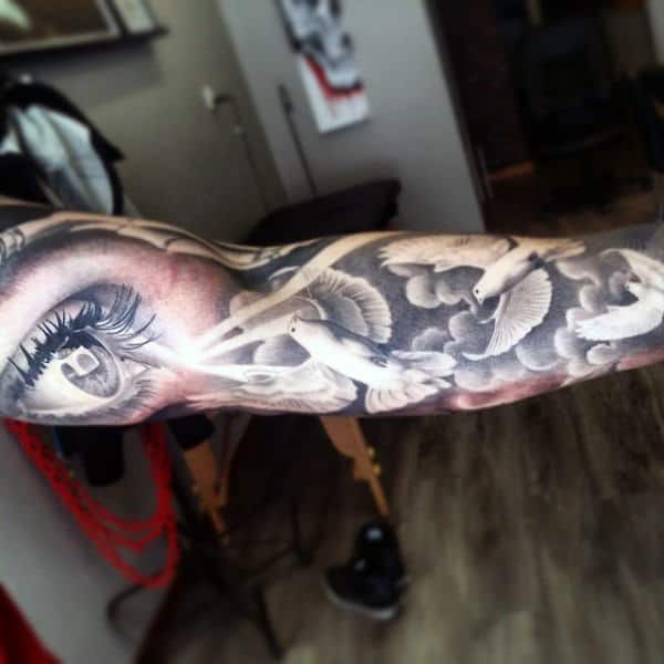 Eye And Dove Cloud Tattoos On Arm For Men