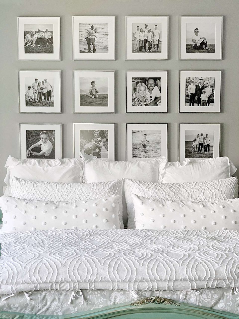 White picture frames on wall with staircase