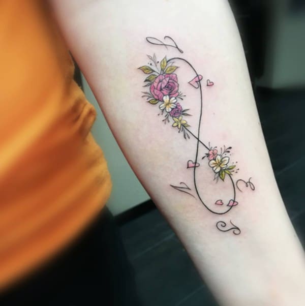 feminine floral tattoo with initials