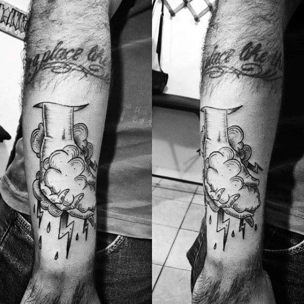 Hand Grabbing Cloud Mens Tattoo On Outer Forearm