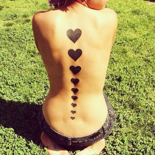 Heart Tattoo Ideas - Hearts down spine - Unique Tattoos