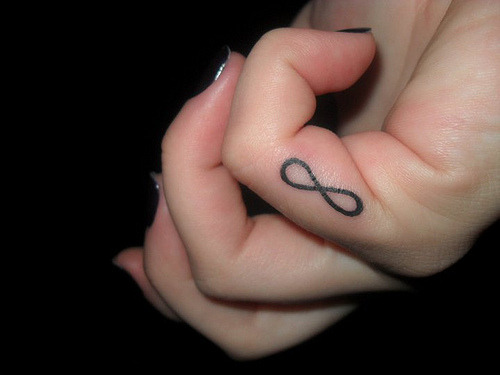 infinity tattoo on little finger