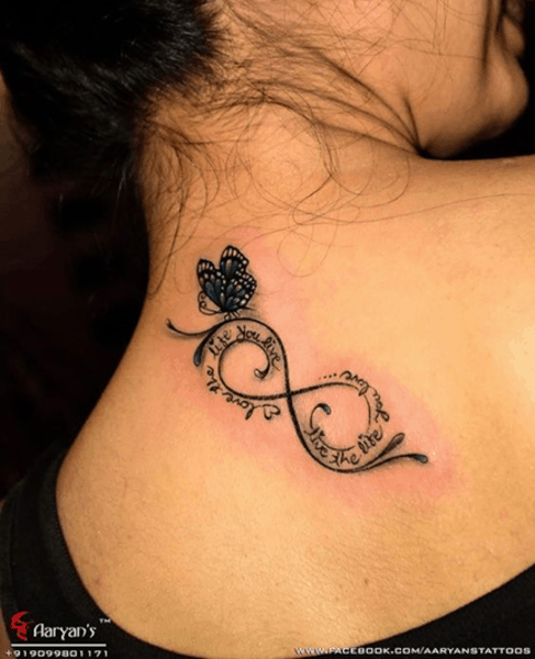 infinity tattoo with quote and blue butterfly