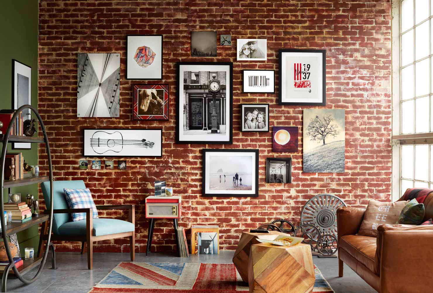 Brick wall with hanging pictures.