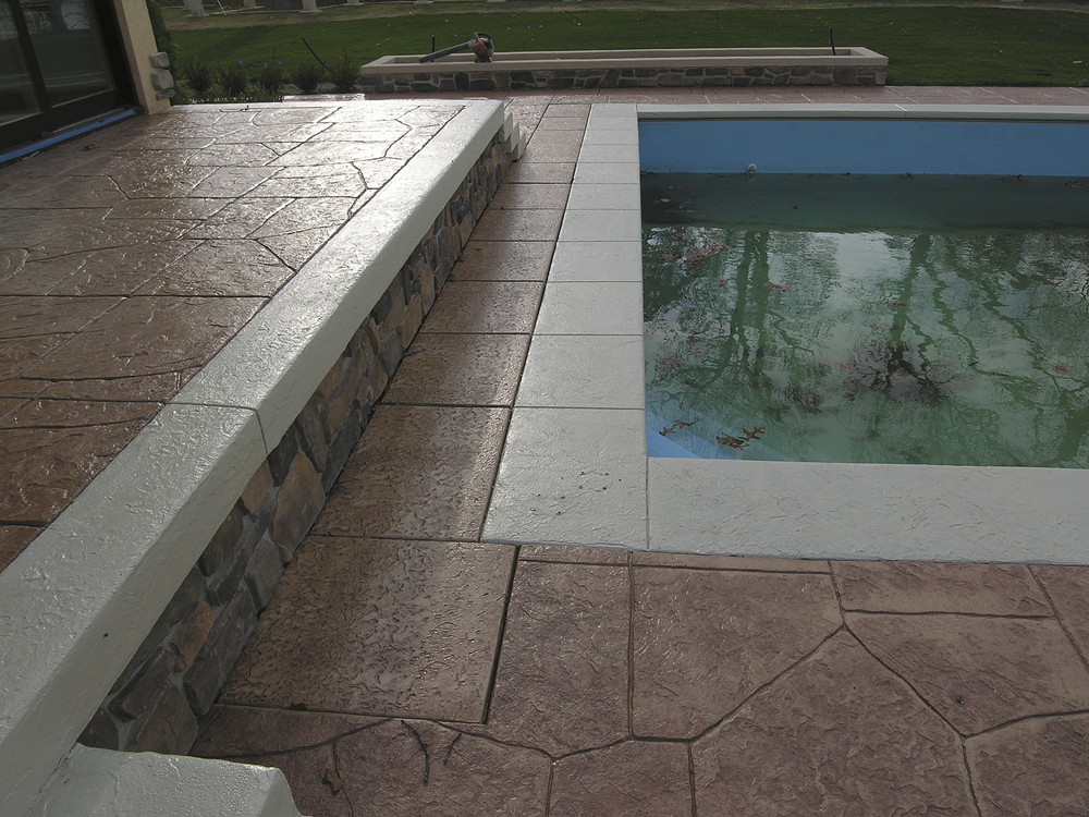 a pool deck with added shark grip in an effort towards fixing slippery stamped concrete