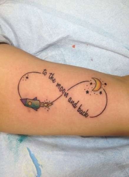 quote with space rocket and moon illustration tattoo on arm
