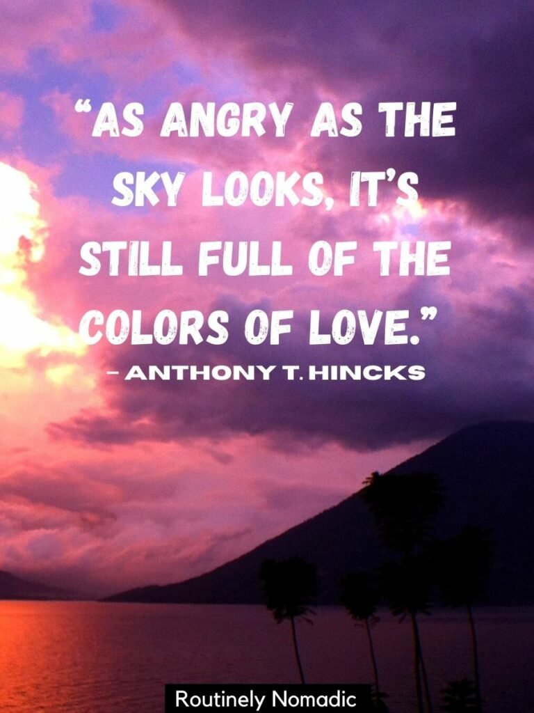 Purple clouds beside a volcano with a sunset love quotes that reads as angry as the sky looks its still full of the colors of love by Anthony T. Hincks