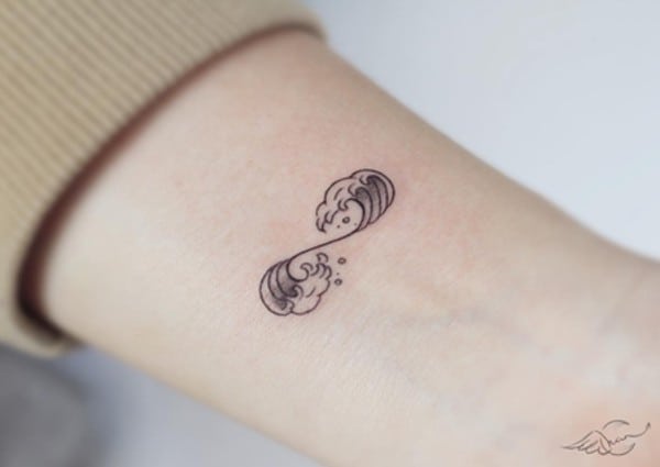 wave forming infinity tattoo on wrist